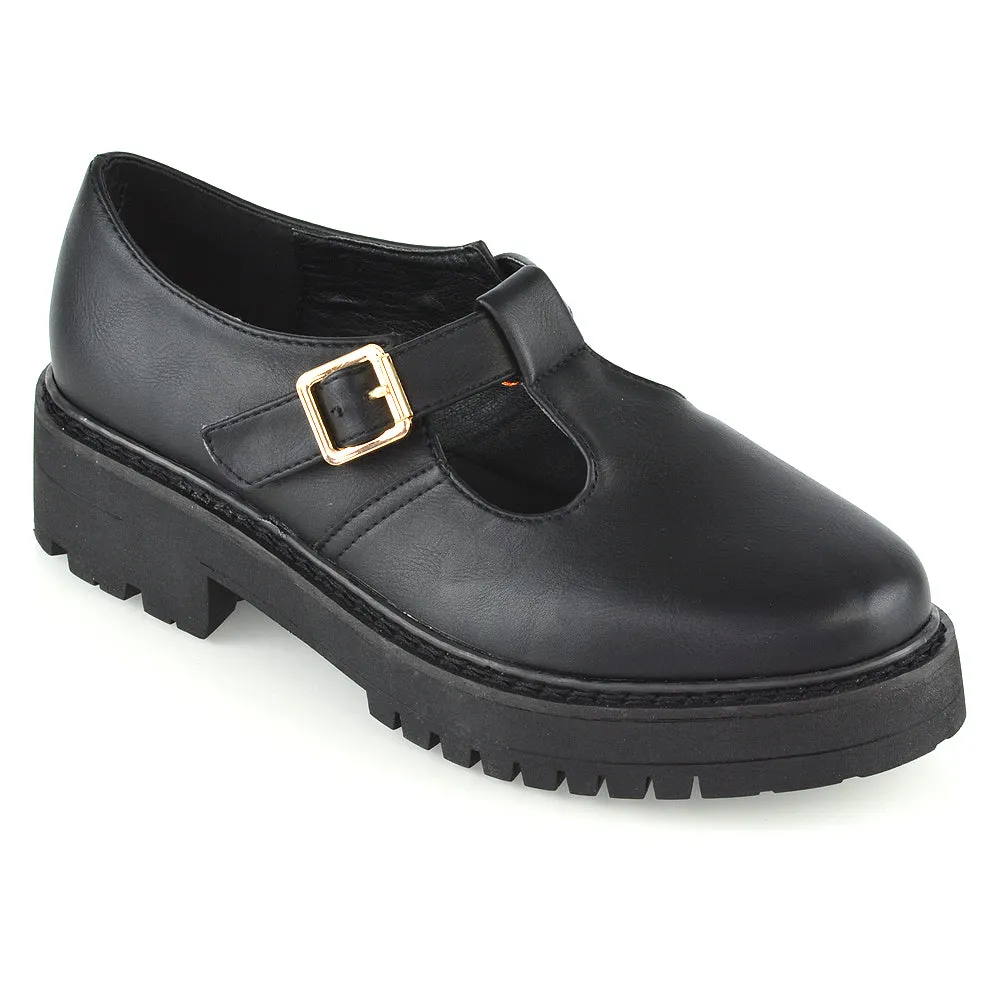 CLARABELLA BUCKLE T-STRAP DETAIL FLAT CHUNKY SOLE BROGUES IN BLACK PATENT