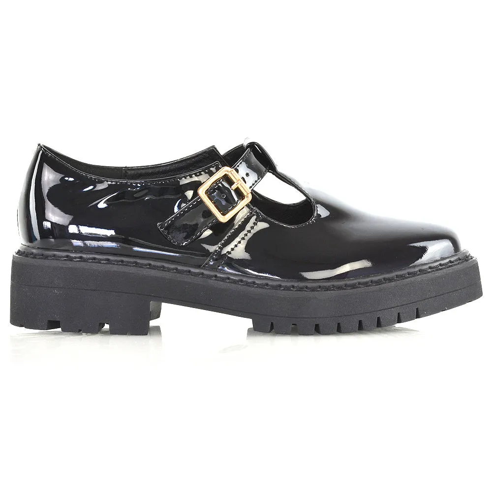 CLARABELLA BUCKLE T-STRAP DETAIL FLAT CHUNKY SOLE BROGUES IN BLACK PATENT