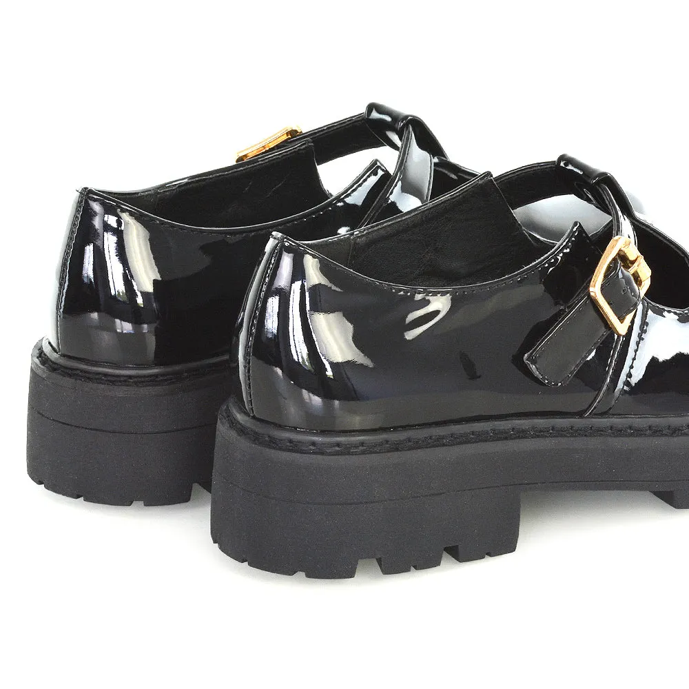 CLARABELLA BUCKLE T-STRAP DETAIL FLAT CHUNKY SOLE BROGUES IN BLACK PATENT